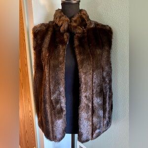 Giacca reversible faux fur vest. New with tags off.